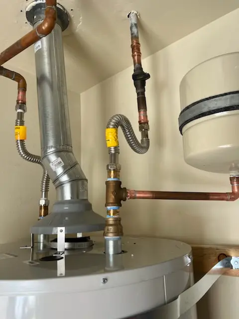 Water heater installation and plumbing repair in Auth Village